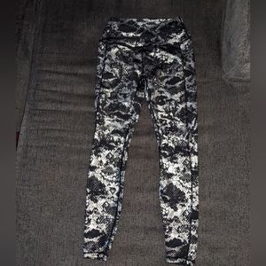 Curves and Combatboots metallic snakeskin print leggings